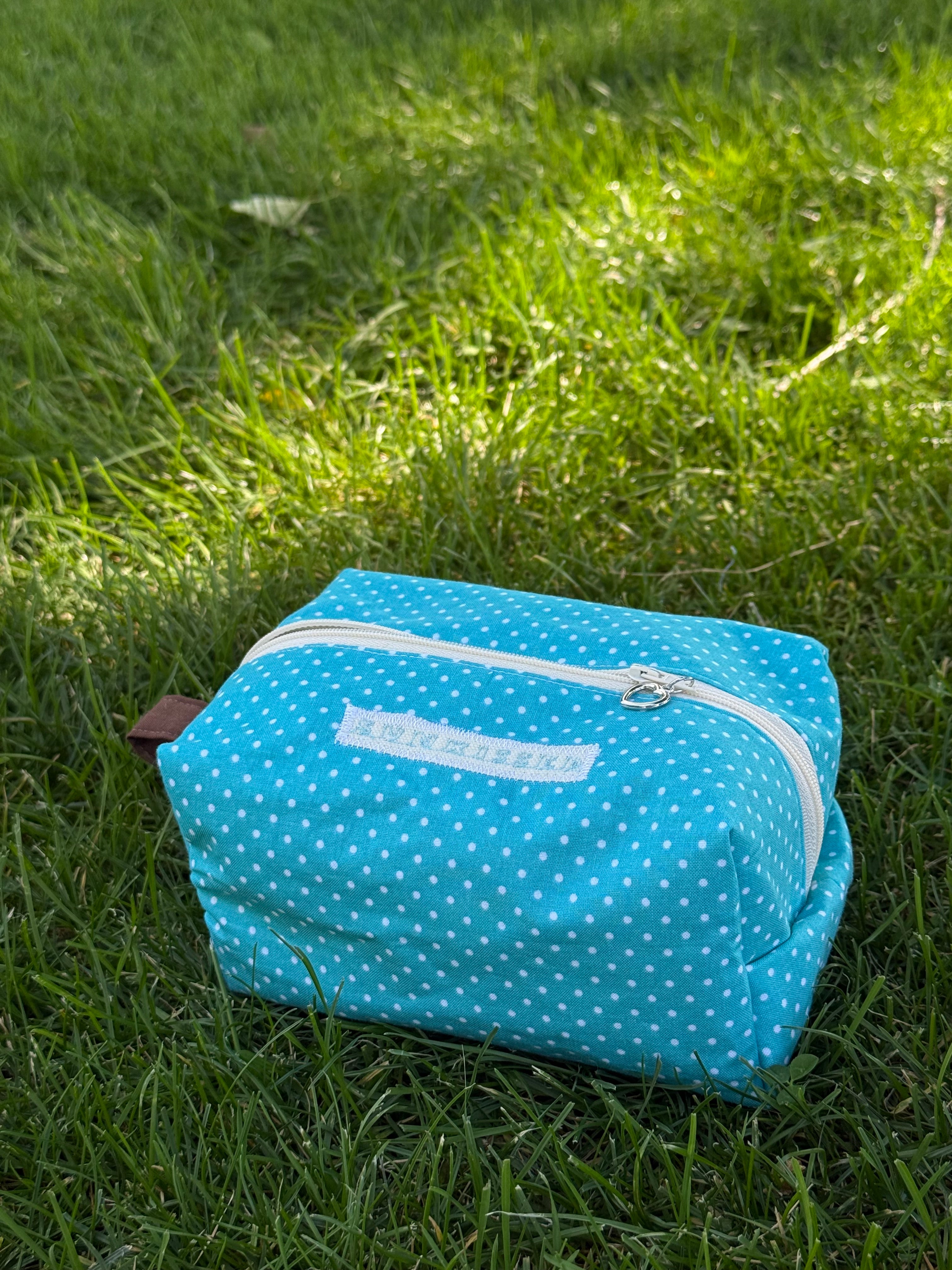 Blue polka dot makeup bag