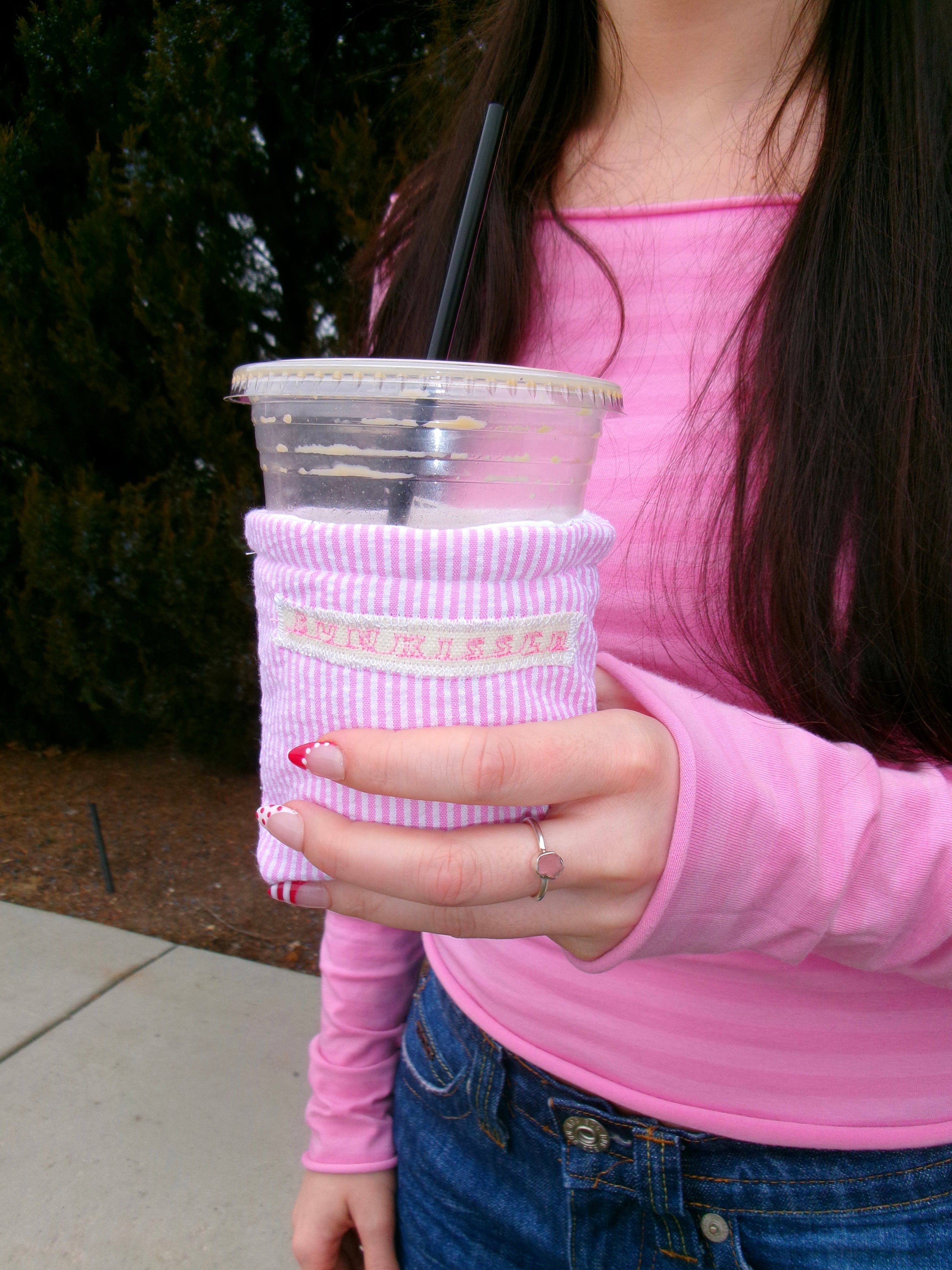 Pink striped coffee koozie