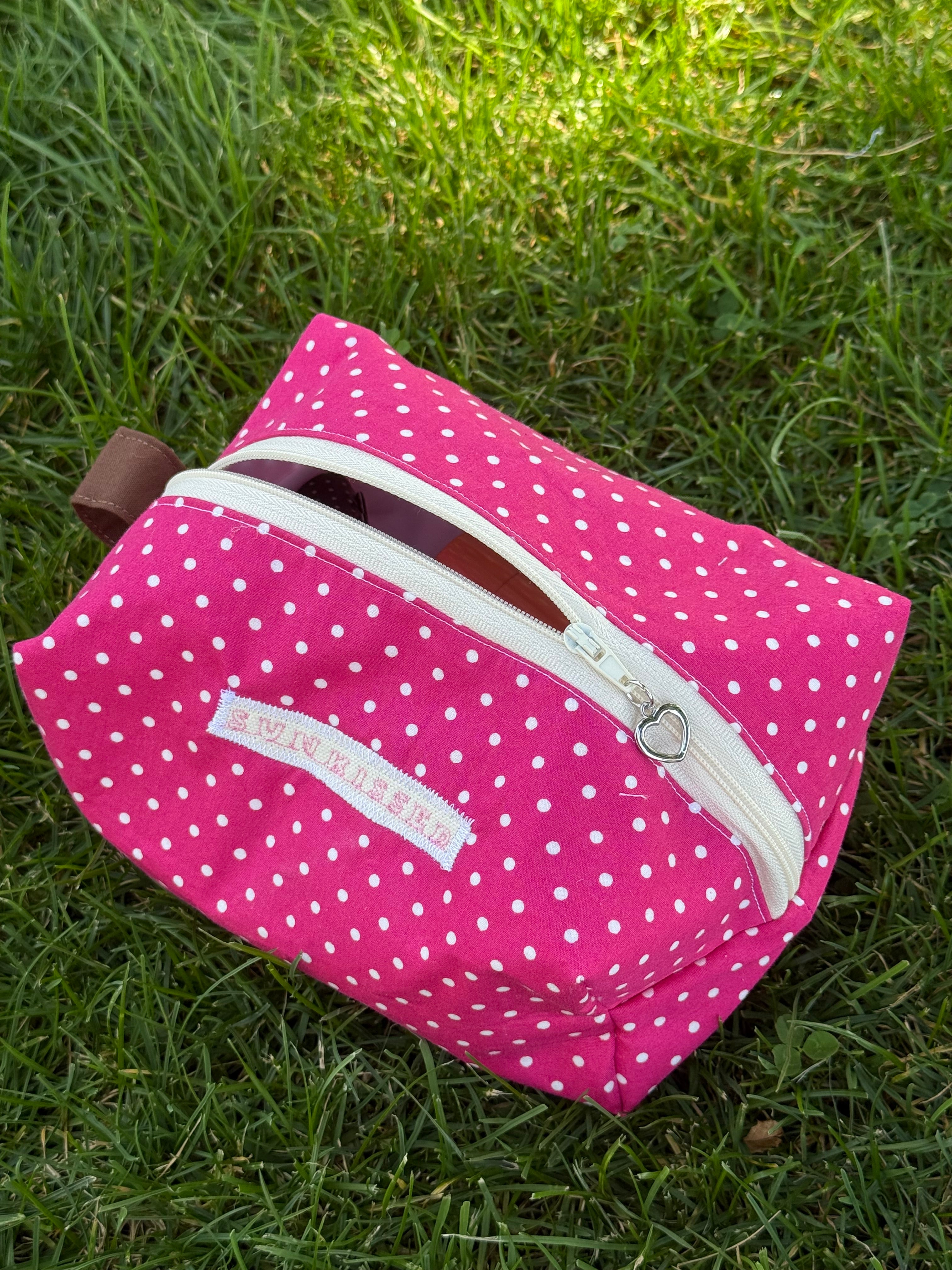 Pink polka dot makeup bag